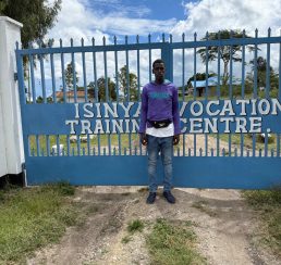 Paying his school fee Paying his school fee